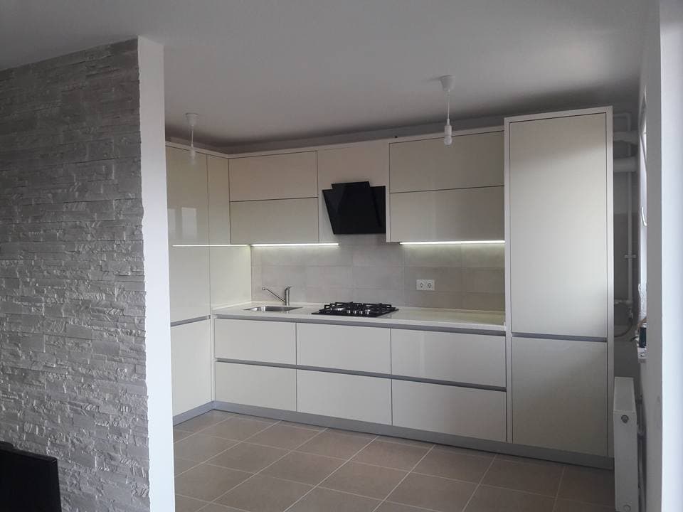 photo of white kitchen for big family