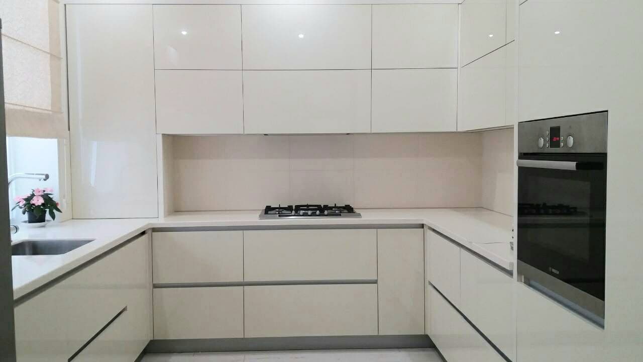 photo of white kitchen for big family